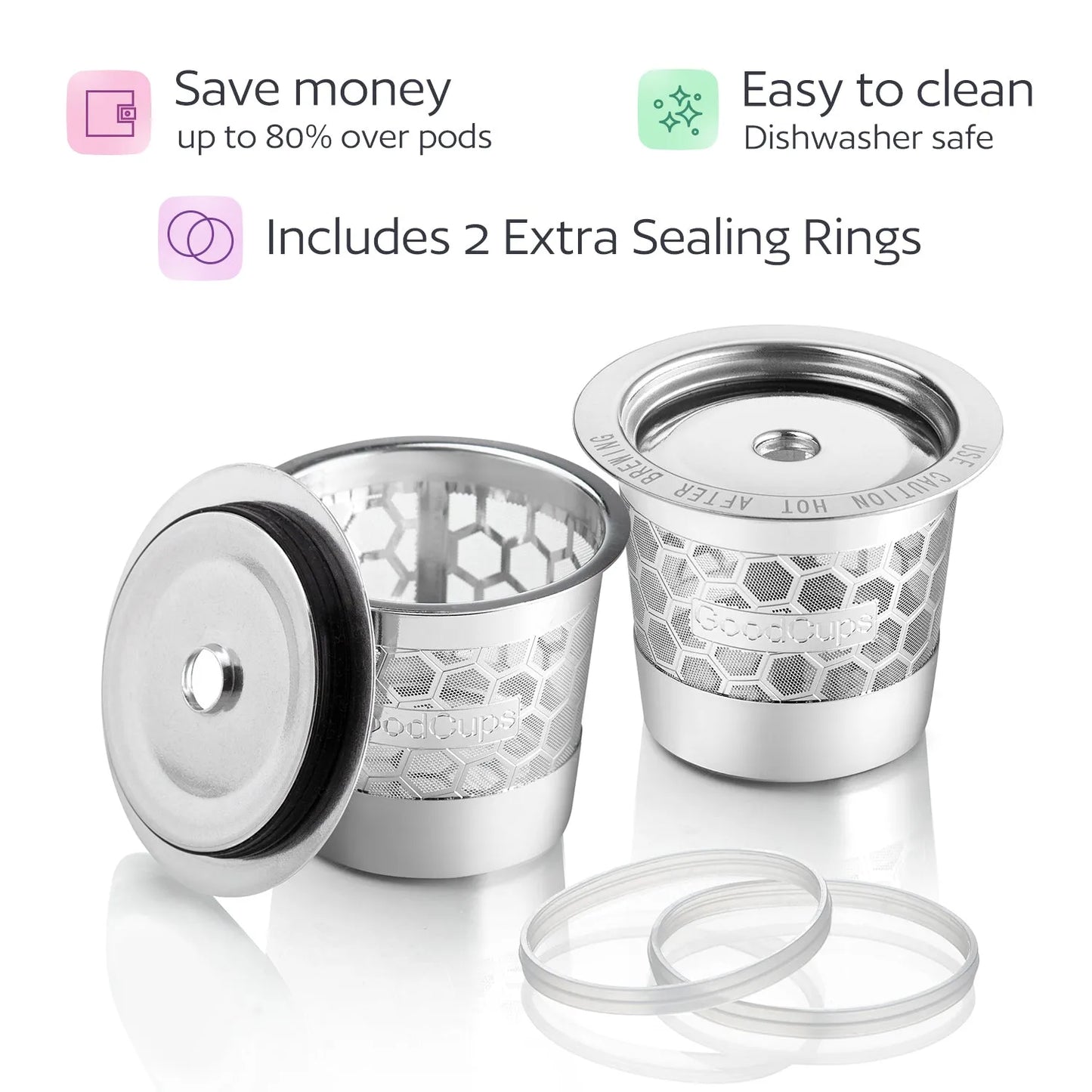 Steel reusable coffee pods with additional sealing rings on a white background