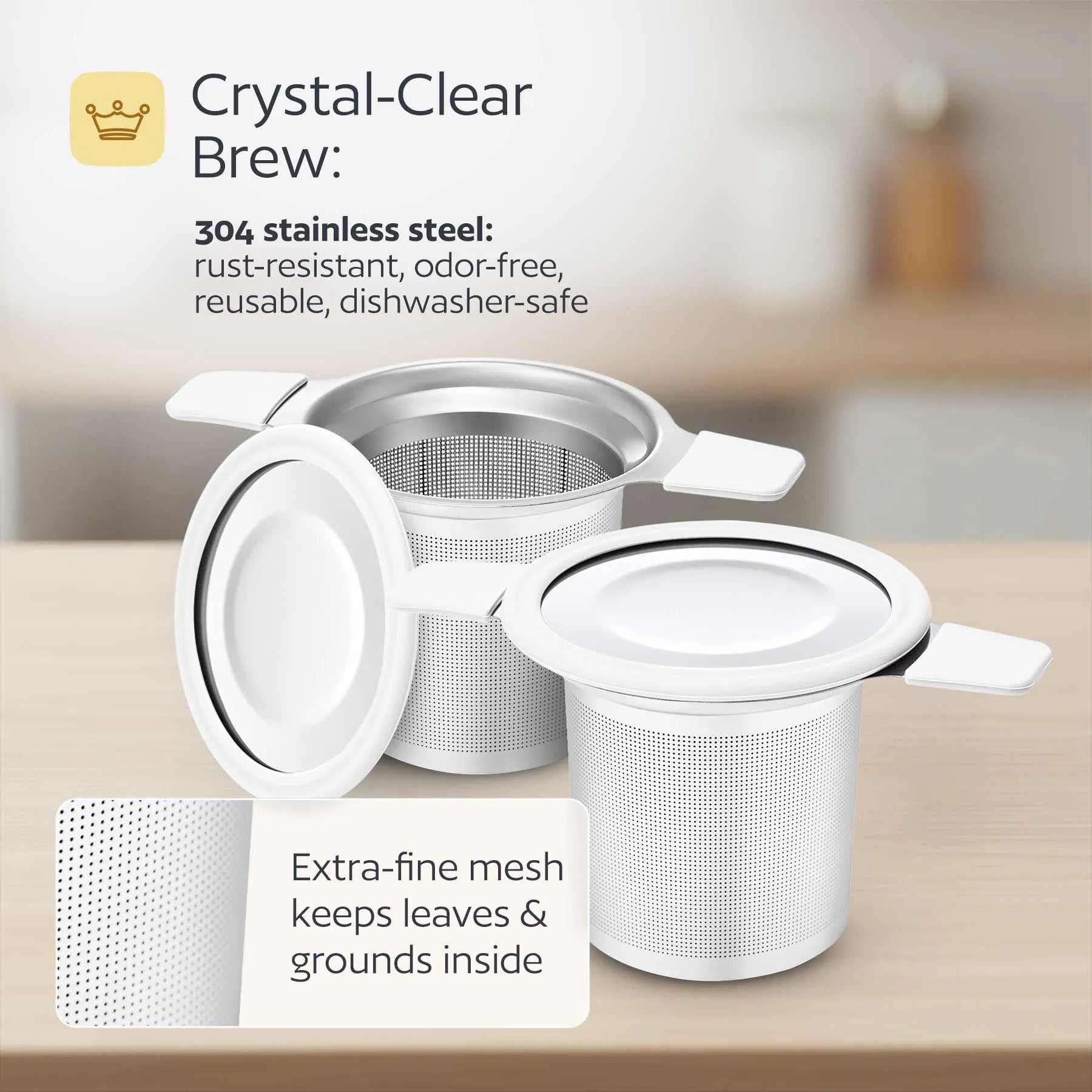 Stainless steel tea infuser with text highlighting features on a wooden surface.