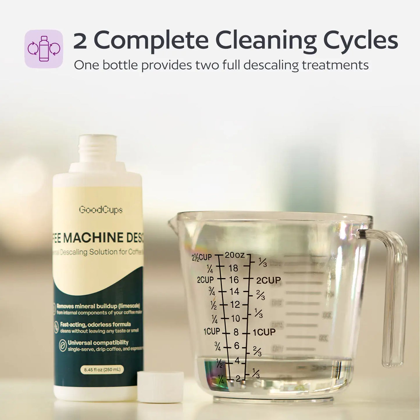 Coffee machine descaling solution bottle and measuring cup on a blurred background