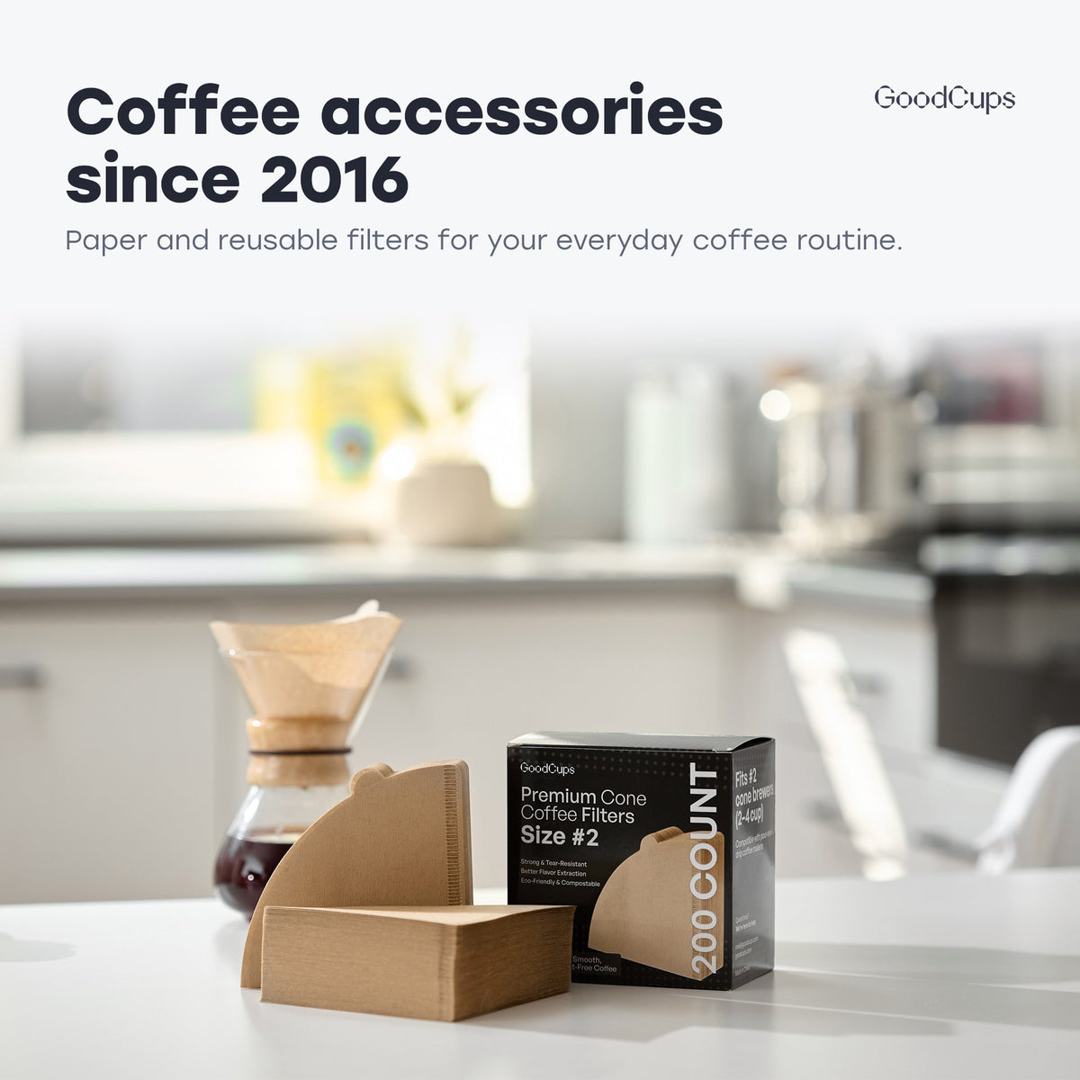 GoodCups coffee accessories since 2016: a box of #2 cone filters and a pour-over carafe in a kitchen